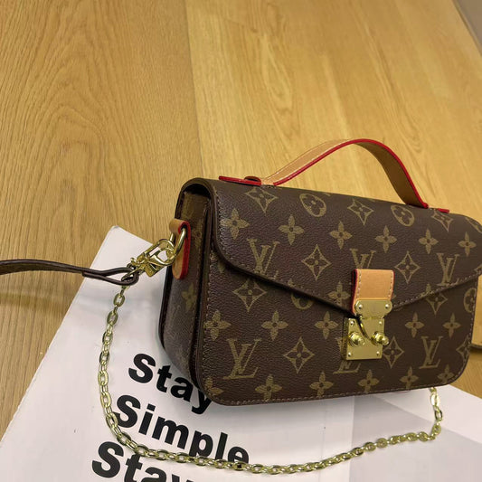 Taška přes rameno Vintage Lock Chain – klasický monogramový design