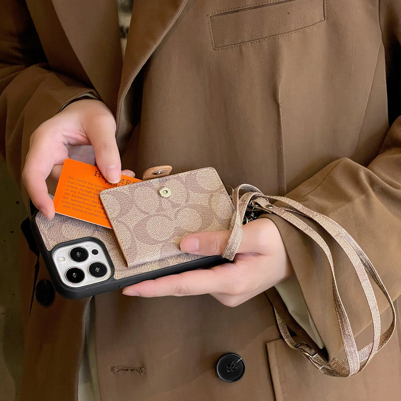 Klasyczne etui na iPhone'a z portfelem i paskiem, białe -SZK240402