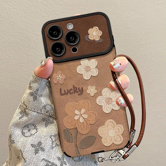 Funda para teléfono de cuero floral con correa para muñeca desmontable